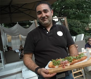 Washington DC's Finer Side: Class Within Reach 5 Puro Cafe owner Rashid Hassouni with the restaurant's signature flatbread