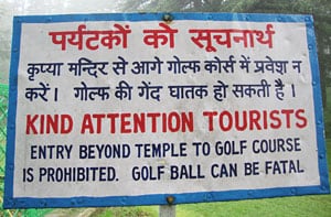 A warning sign on the golf course