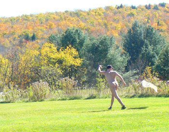 Flying a kite in Halifax Vermont at a clothing optional campground and hotel. photo by Max Hartshorne.