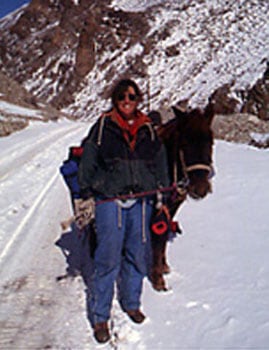 Wilson's wife Cheryl in the Himalayas with their faithful horse Sadhu.
