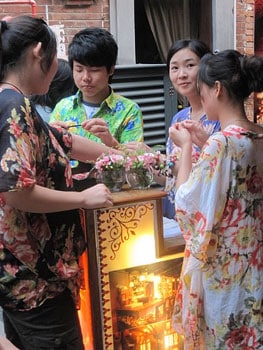 Getting ready for a busy night at their cafe in the Tianzifang district of Shanghai.
