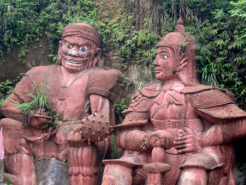 Large statues oversee the grounds at Tusi Castle in Enshi, China.