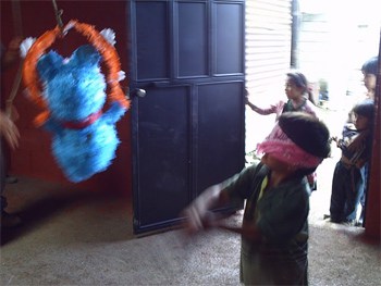 House Building in Guatemala 3 Celebrating the completed house in Guatemala with a pinata party.