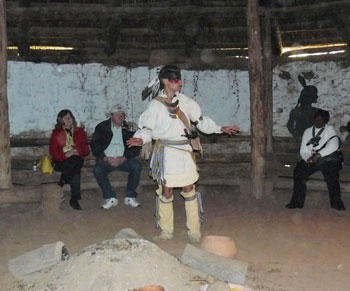 Cherokee Nation: A Fascinating Historical Site 7 Guide Scottie Ennis in the Council House at the Ancient Village.