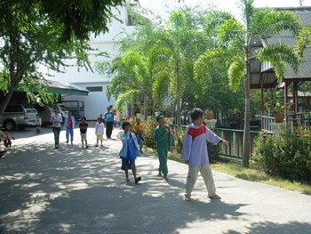 The beautiful courtyard of the Center with the children going to lunch.