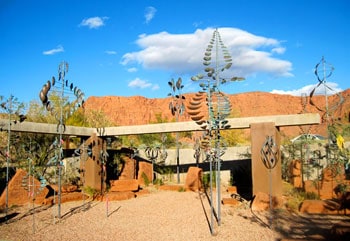 St. George, Utah: Red Rocks Calling 9 Sculptures spin gently in the wind at The Coyote Gulch Art Village in Kayenta, Utah.