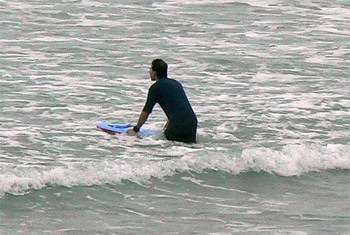 Australia's Great Ocean Walk: Magnificent! 5 Surfer in Lorne, Victoria, Australia.
