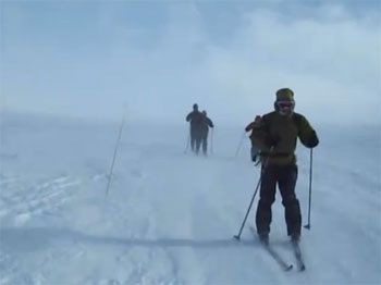 Skiers on exposed Rondane fells Rondane Mountains