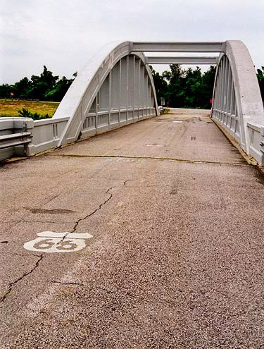Small arch-shaped bridge west of Riverton, Kansas.