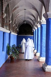 Sisters of Santa Catalina walk the halls.