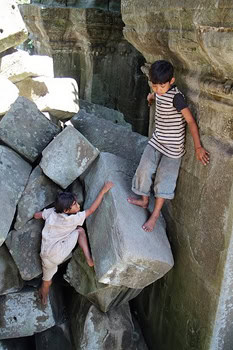 Bang-Maelea Kids climbing on the ruins.