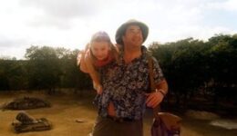 Jon and Loulou Voeklel ascend a Mayan Pyramid.