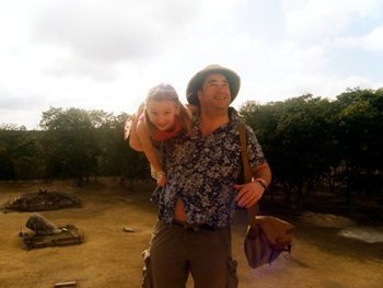 Jon and Loulou Voeklel ascend a Mayan Pyramid.
