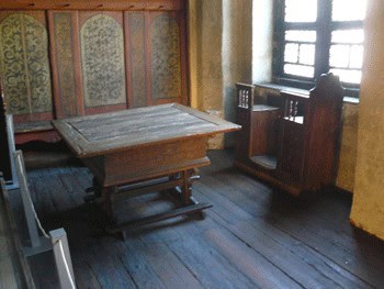 Luther's work table at his home in Wittenburg. His wife Katarina like to sit by the window and sew.