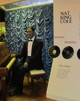 Alabama: The Birth of the Blues 2 Nat King Cole figure at the Alabama Music Hall of Fame.