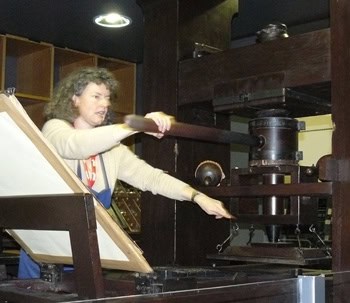 Tour guide Judith König conducts a demonstration at the Gutenberg Museum in Mainz.