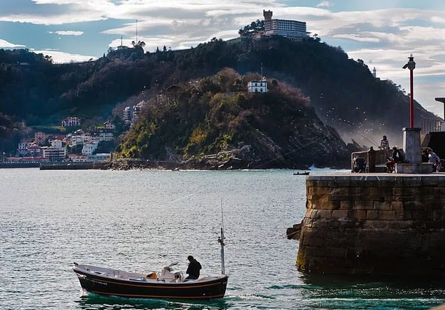 Fisherman going out to sea in San Sebastian, Spain. photo by Paul Shoul.