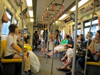 People ride the BTS Sky Train throughout Thailand. It's an easy and efficient way to travel.