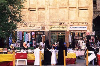 Old and New Intertwine in Qatar Stalls with Shoppers at Souk Waqif, Doha Photos by Julian Worker