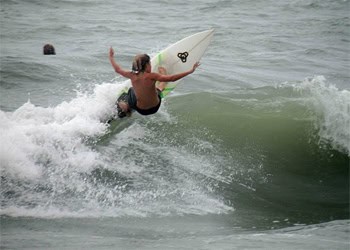 Whether ripping it yourself or watching from the beach, Canoa has some great surfing and surfers. Photo: CanoaThril?ls.com