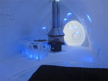 A premium deluxe suite with a woodstove at Quebec City's Ice Hotel. photos by Will McGough.