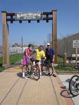 The trail arch sign reads "New Haven and Northampton Railroad..the Canal Line."