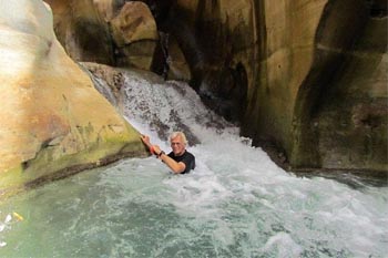 The author oing upstream at Wadi Mujid.