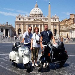 Vespa touring in Rome.