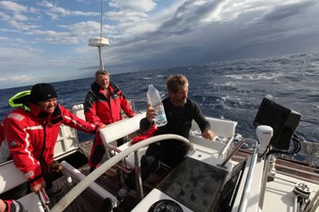 Crew members aboard the Scorpius in the Arctic.