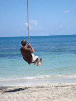 Swinging on a tree in Providencia.