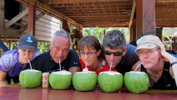 Tour members quenching their thirst after a long day of cycling.