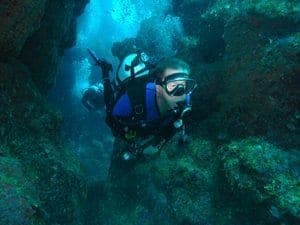 Honduras: Diving off the Coast of Guanaja 3 Phil navigates cliffs around Black Rock 1 dive site