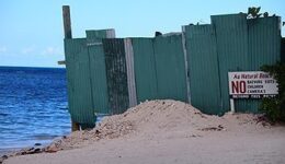The big green fence.