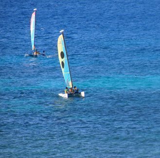 Jamaica's Nude Beaches 4 Catamarans in the distance at the nude beach in Montego Bay.