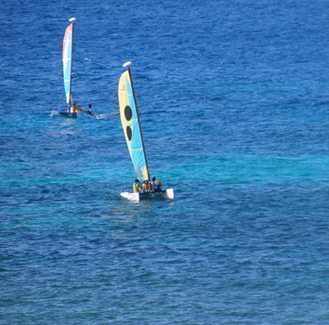 Catamarans in the distance at the nude beach in Montego Bay.