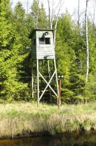 The camp has guard towers, barbed wire and a moat, reminiscent of the Soviet gulags.