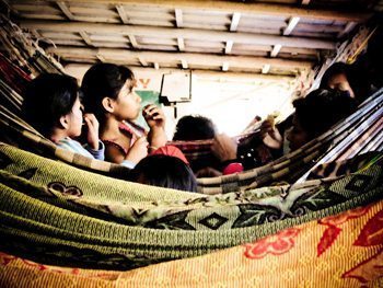 By cargo ship, to the Amazon 2 Kids slept on hammocks down below.