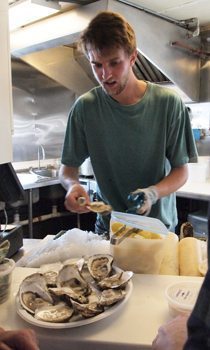 Martha's Vineyard, Massachusetts 13 Shucking oysters at Larsen's Fish, Menemsha.