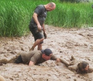 The mud slide is the most fun part of tidal bore rafting in Urbania! 