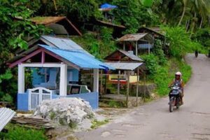 Indonesia's Remote West Papua A Roadside Christian Cemetary, Fak Fak Photo: Michael Britton
