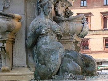 The famous statue of Neptune is adorned with women with water jetting out of their breasts. Max Hartshorne photo.
