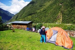 Anita makes up the tent, and then accesses her work.