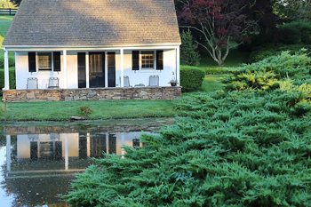 Pennsylvania: Luxurious Longwood Gardens 3 The Inn at Whitewing Farm - Our lovely cottage reflected in the pond.