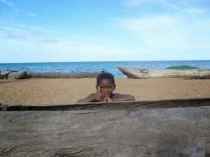 Malawi: Climbing the Biggest Mountain 3 An inquisitive boy gives me a thumbs up in Nkhata Bay. The children were incredibly curious and friendly throughout Malawi.