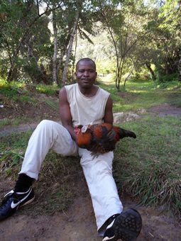 Malawi: Climbing the Biggest Mountain 8 A guide at the hut shows us our dinner for the night.