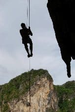 A rock climber hangs over Tonsai Bay, Thailand. Eloise Horsfeld photos.