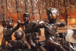 Carved figures in the choir chapel inside the cathedral in Auch.