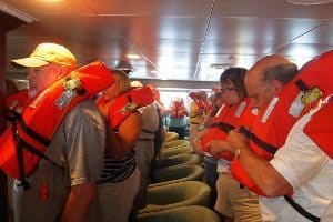 Passengers learn safety practices aboard the vessel. 