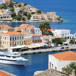 Greece Getaway: Camping Hacks for Your Next Getaway 5 Symi island's harbor in Greece.