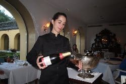 Serving Portuguese rose wine at Restaurant Pedro & Ines at Quinta das lagrimas